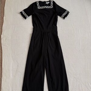 Elegant Black Jumpsuit with Embroidered Sleeves